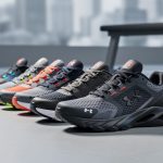 Seven neatly arranged Under Armour–style sneakers with visible tread patterns in a modern studio setting.